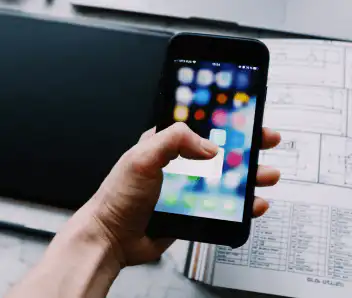 Software interface shown on a mobile phone for agents on the go